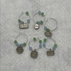 Wine charms. Six International charms.
